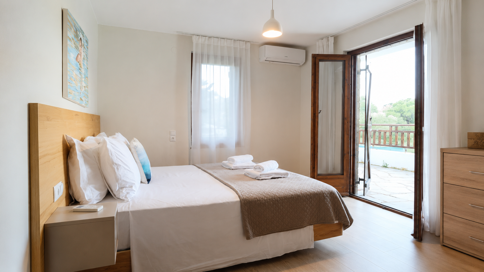 Double bedroom opening to a private terrace