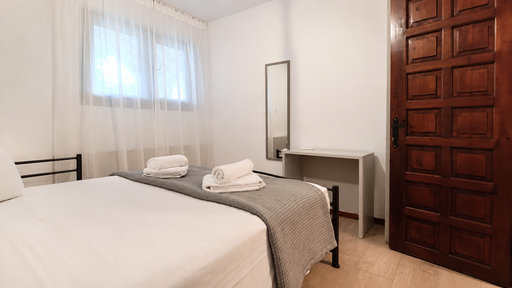 Comfortable guest room with work desk