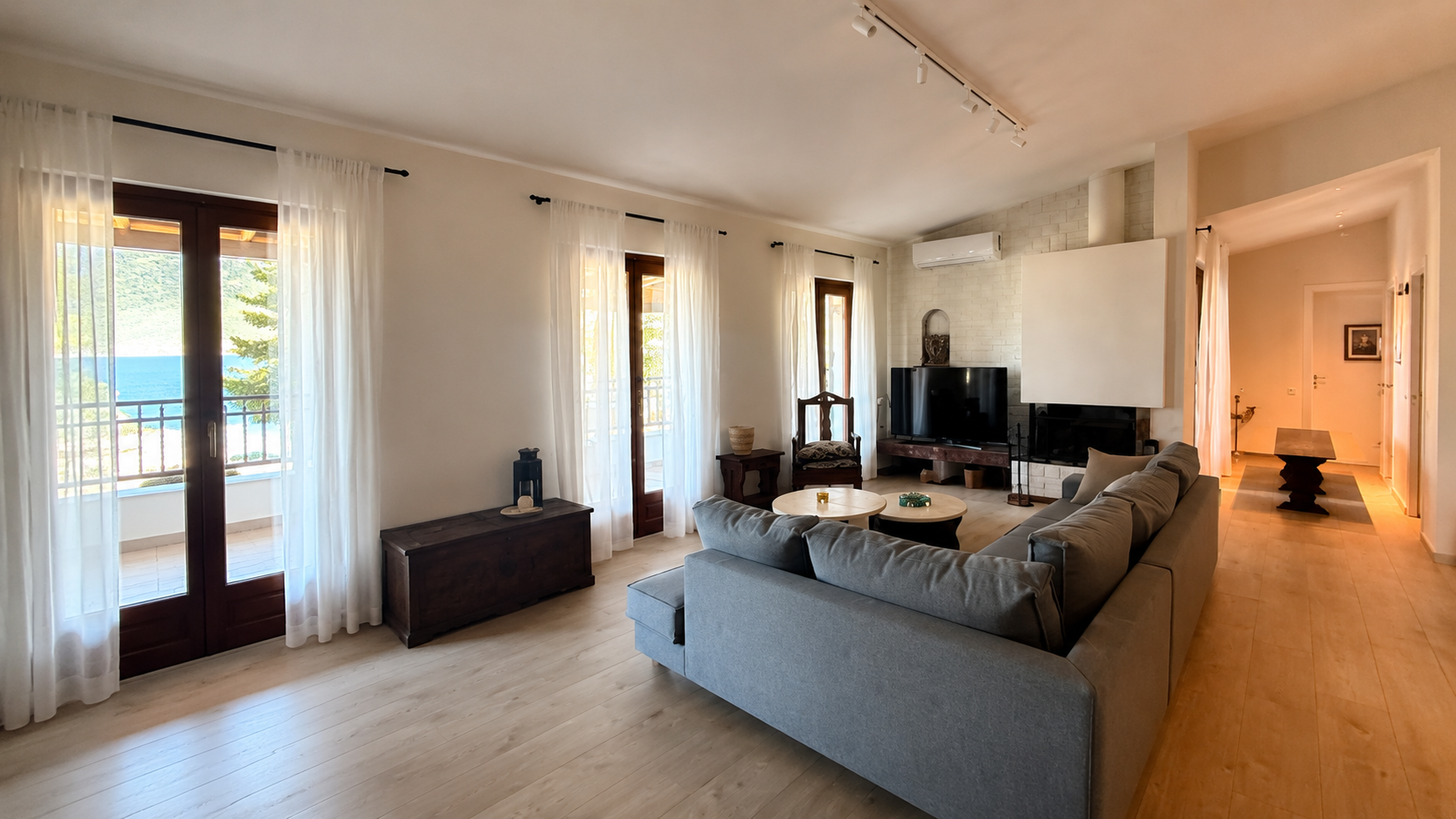 Sea-facing lounge with fireplace